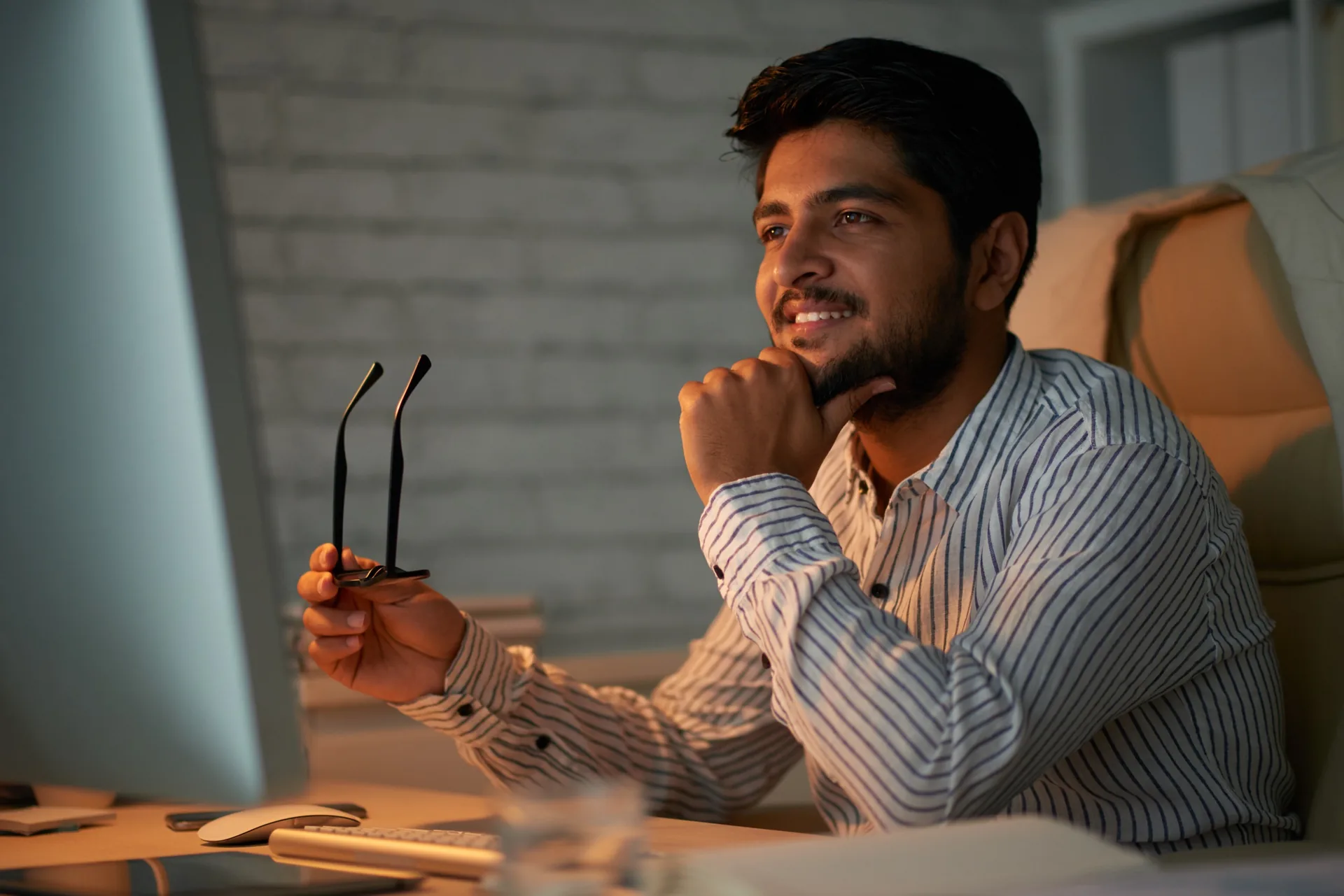 Business professional managing operations with TEZ ERP